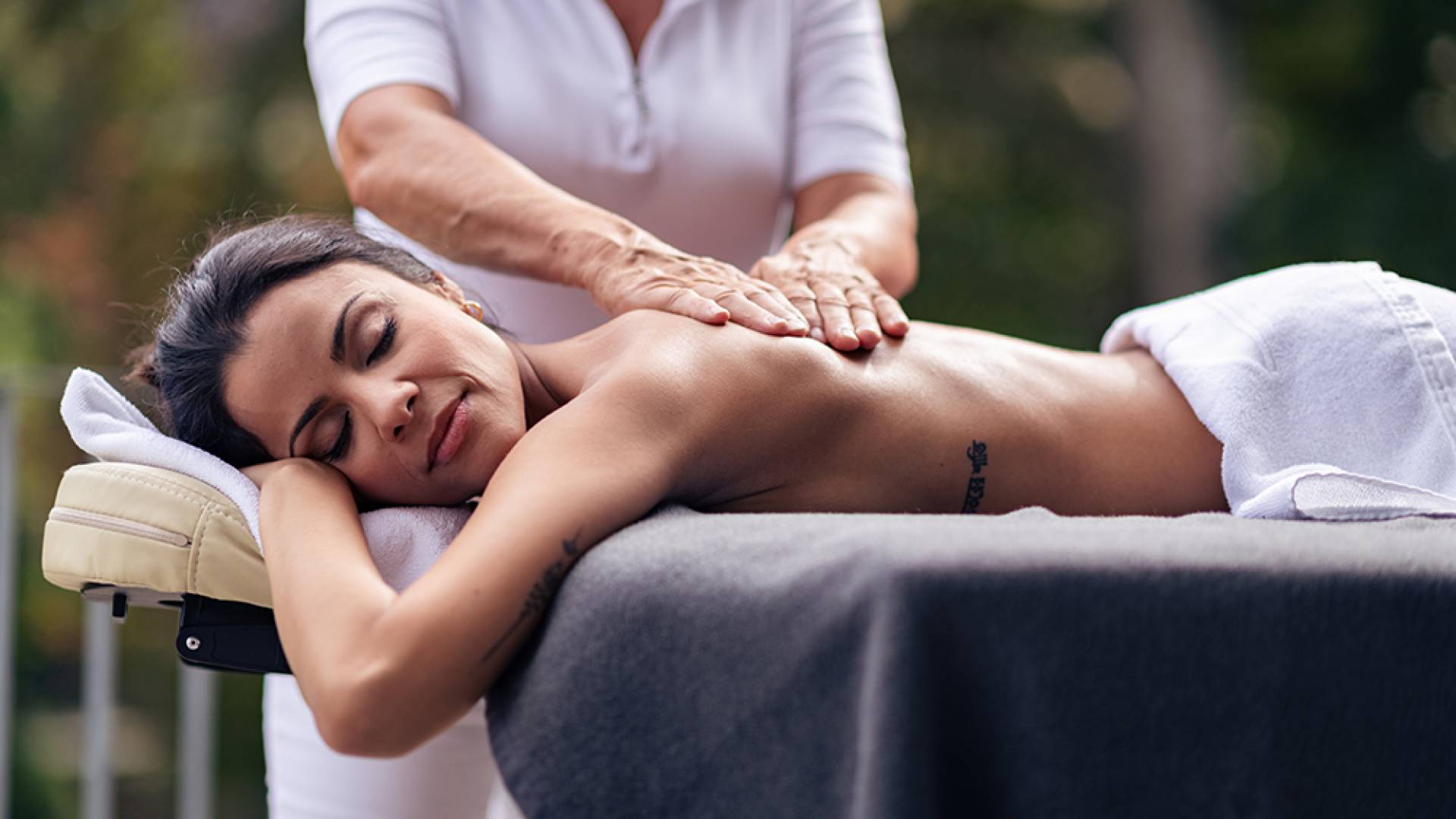 enjoying a massage in the spa area